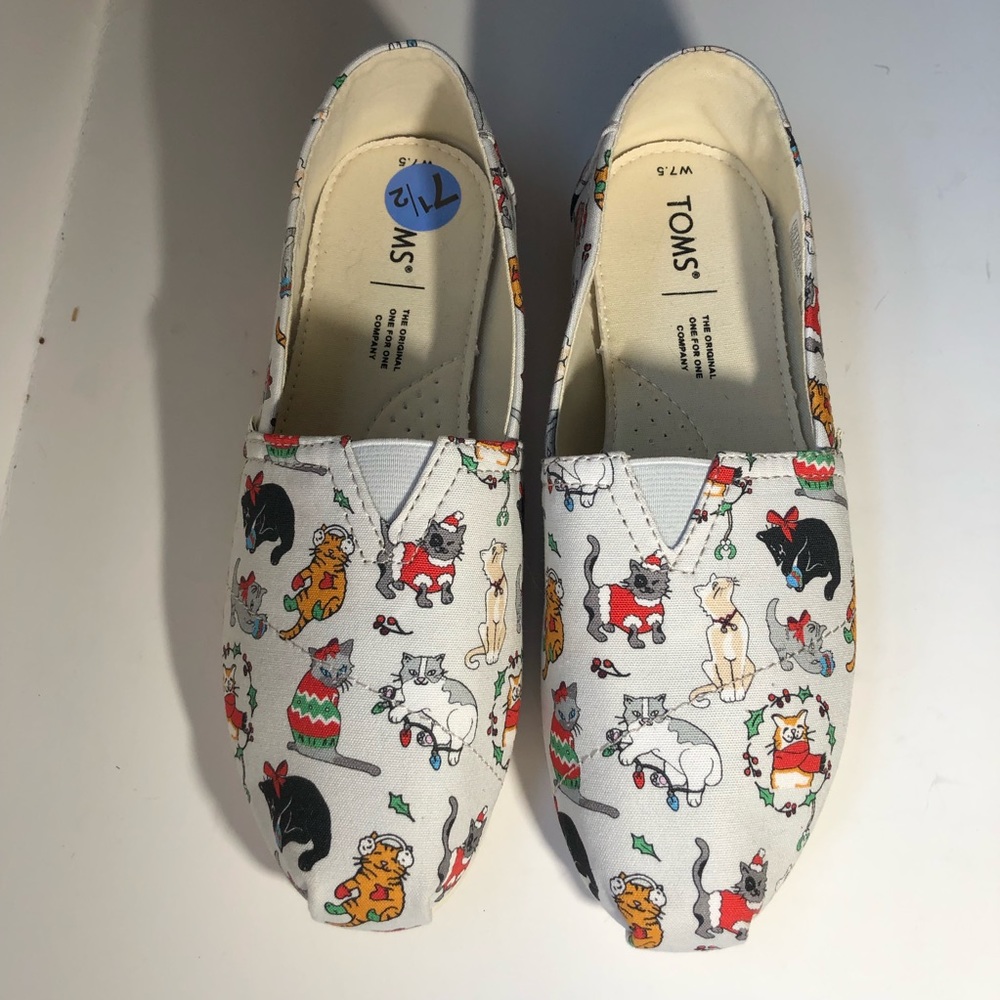 Tom’s slip on size 7.5 never worn